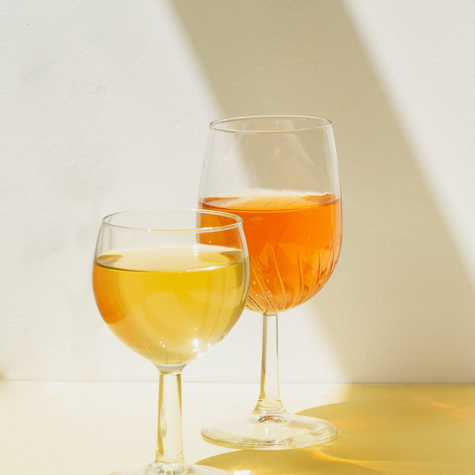 two cups of red rice wine and yellow rice wine